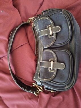 Dooney & Bourke Black Shoulder Bag with Front Buckle Pockets